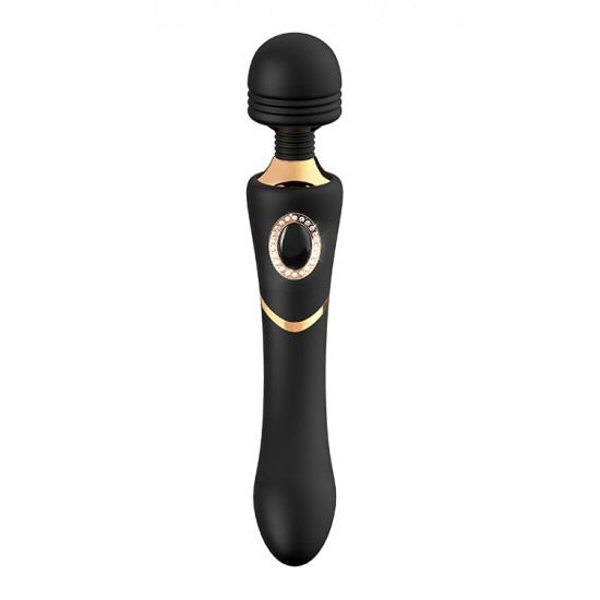 O estimulador wand Monica da coleção Prestige da Dream Toys é uma varinha preta com detalhes elegantes em dourado, um botão em forma de diamante, um cabo firme e resistente, uma cabeça arredondada e um pescoço flexível.