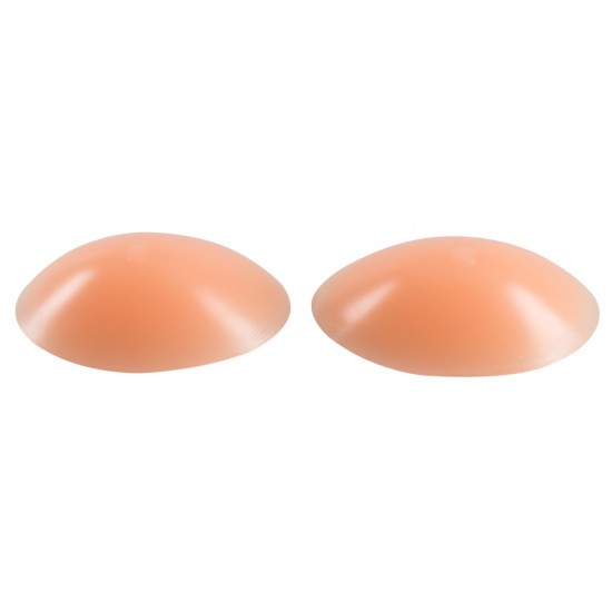 2 anatomically shaped silicone pads: your breasts will appear 1-2 cups bigger than before. Each one is stored inside a box. Skin-toned.