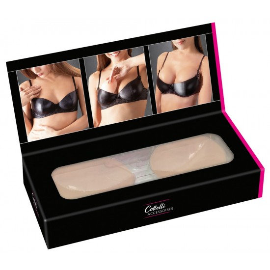 2 anatomically shaped silicone pads: your breasts will appear 1-2 cups bigger than before. Each one is stored inside a box. Skin-toned.